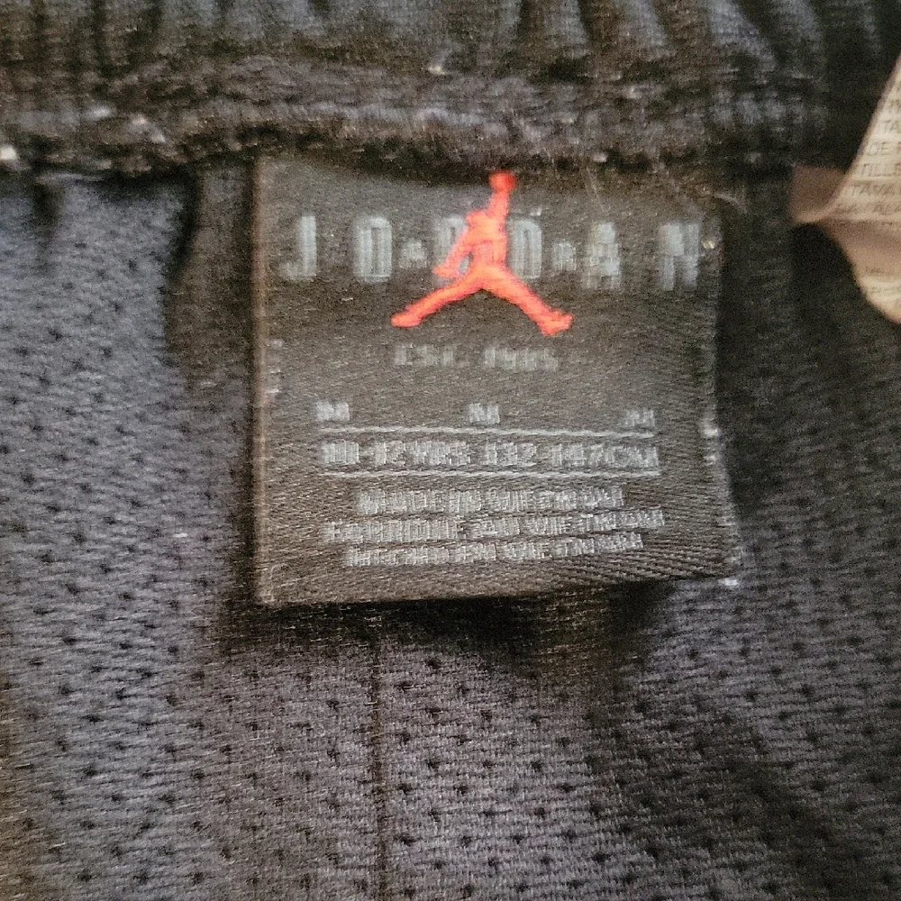 Jordan Black and White Athletic Basketball Shorts with Red Jumpman